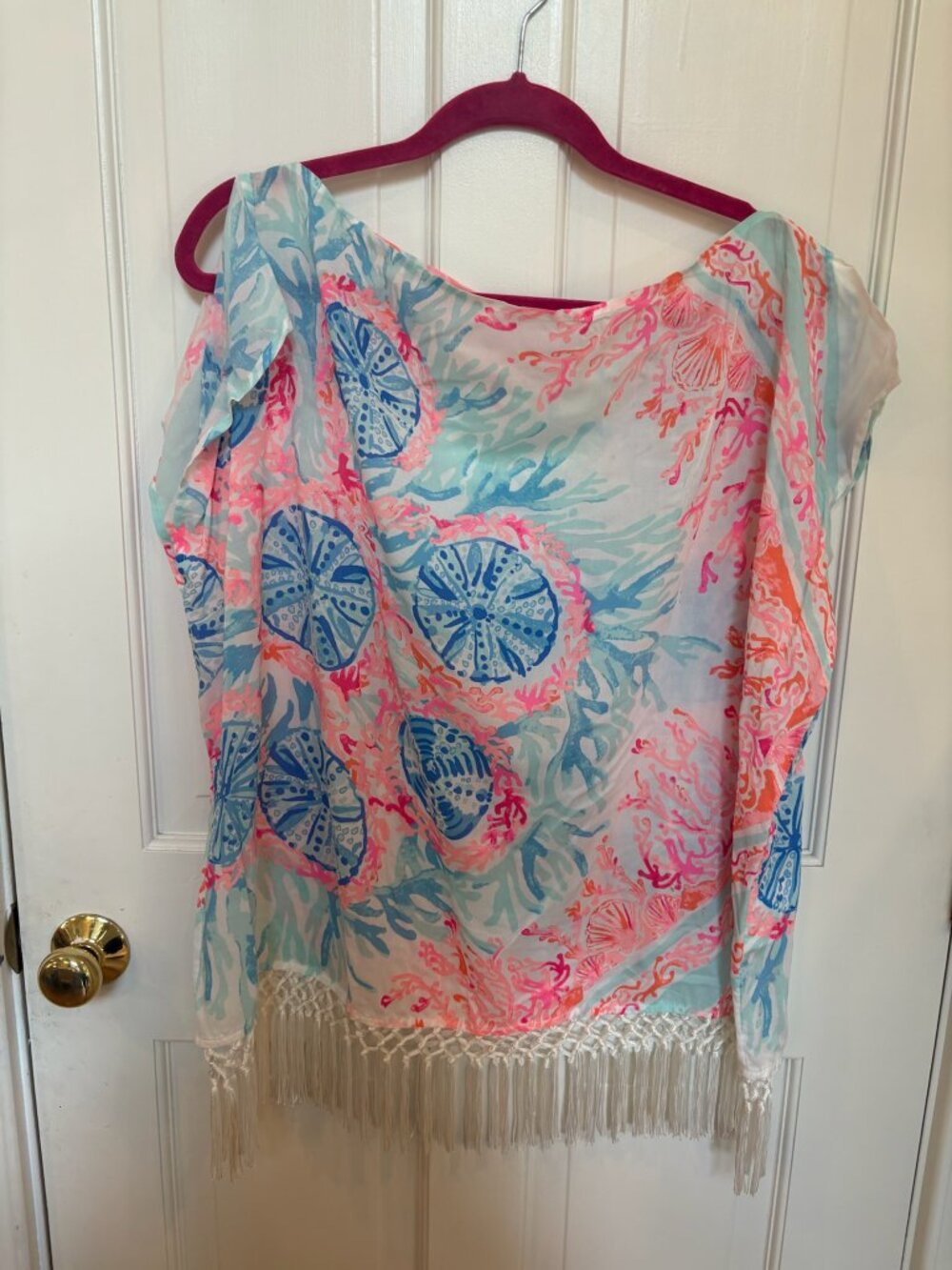Lilly Pulitzer poncho cover-up/top in the print "Roar of the Seas."